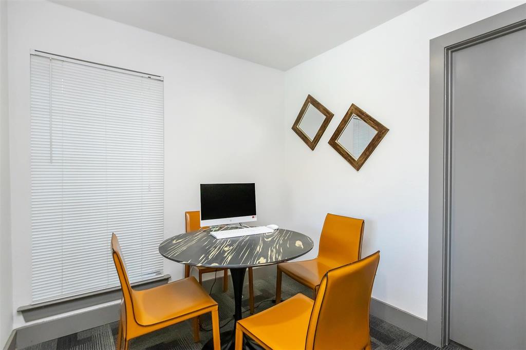 a view of a livingroom with furniture