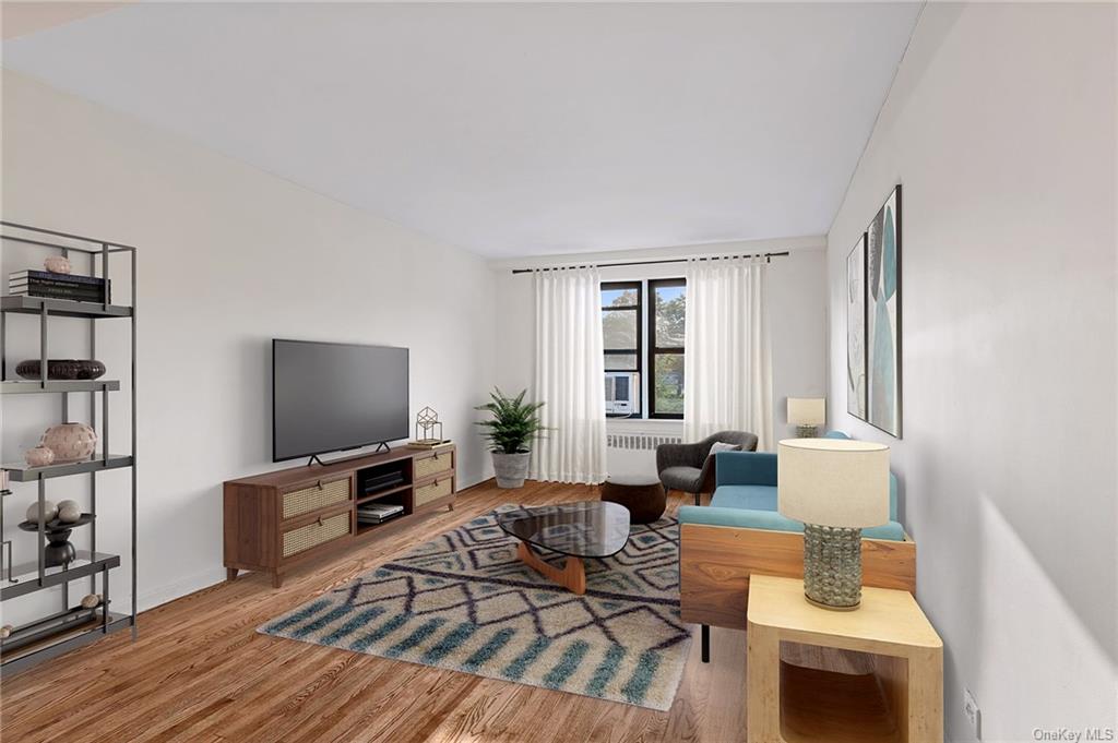 Living room with light wood-type flooring