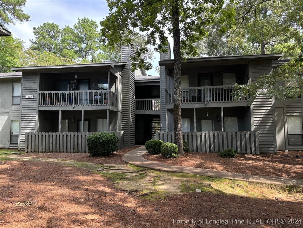 a front view of a house with a porch