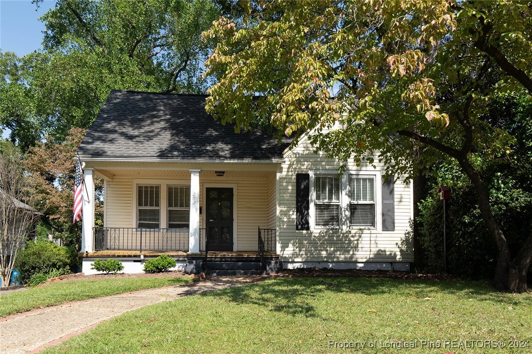 front view of a house with a yard