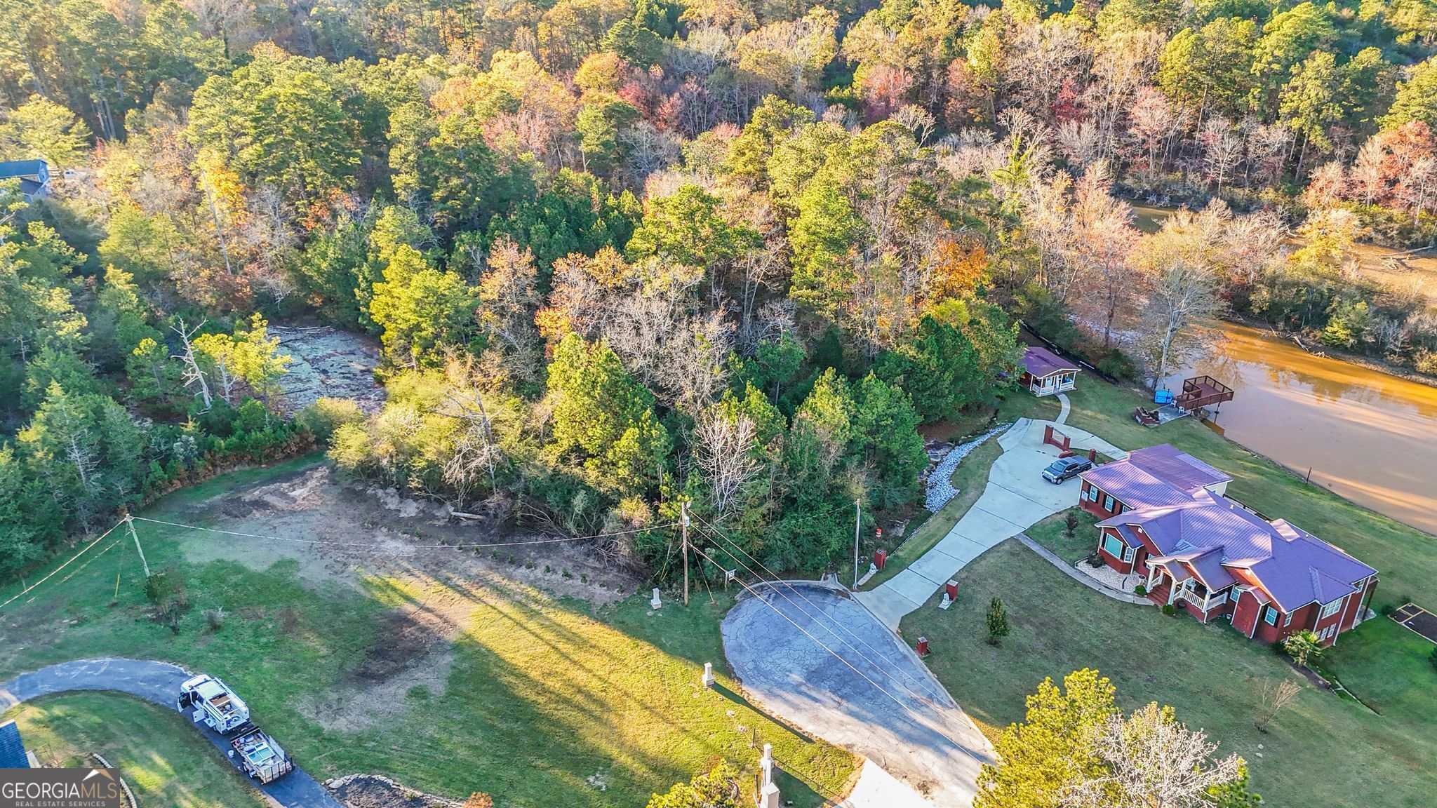 an aerial view of residential house with outdoor space