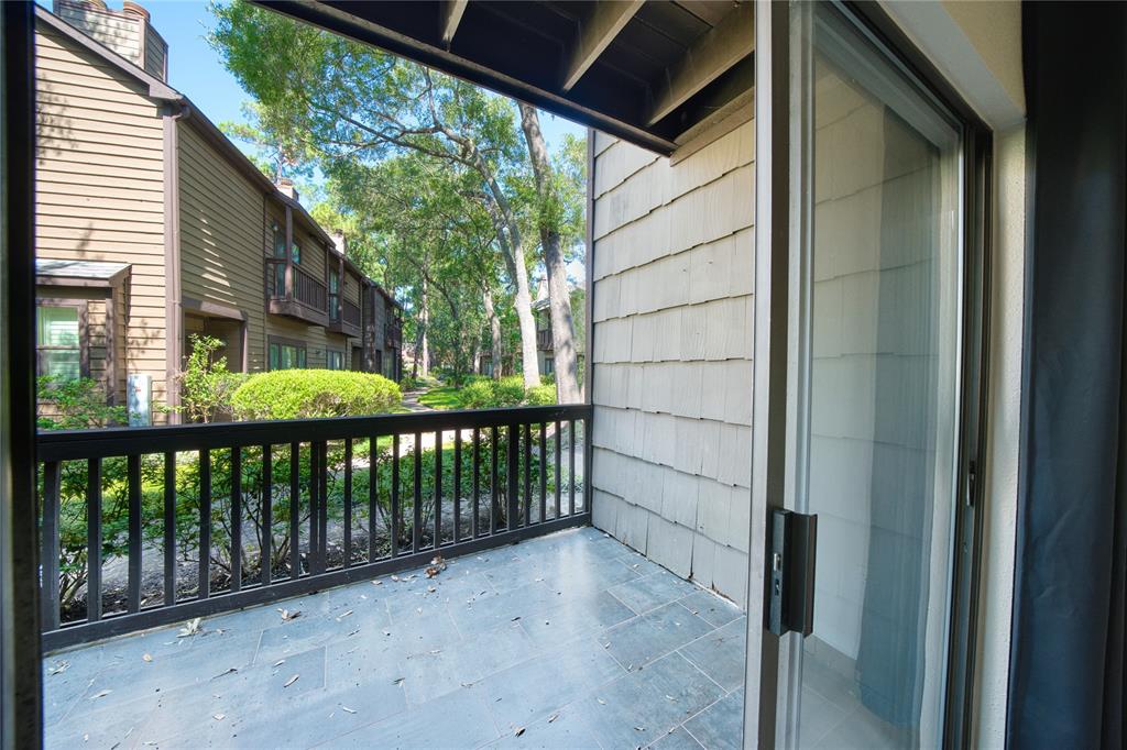 a view of a porch with a yard