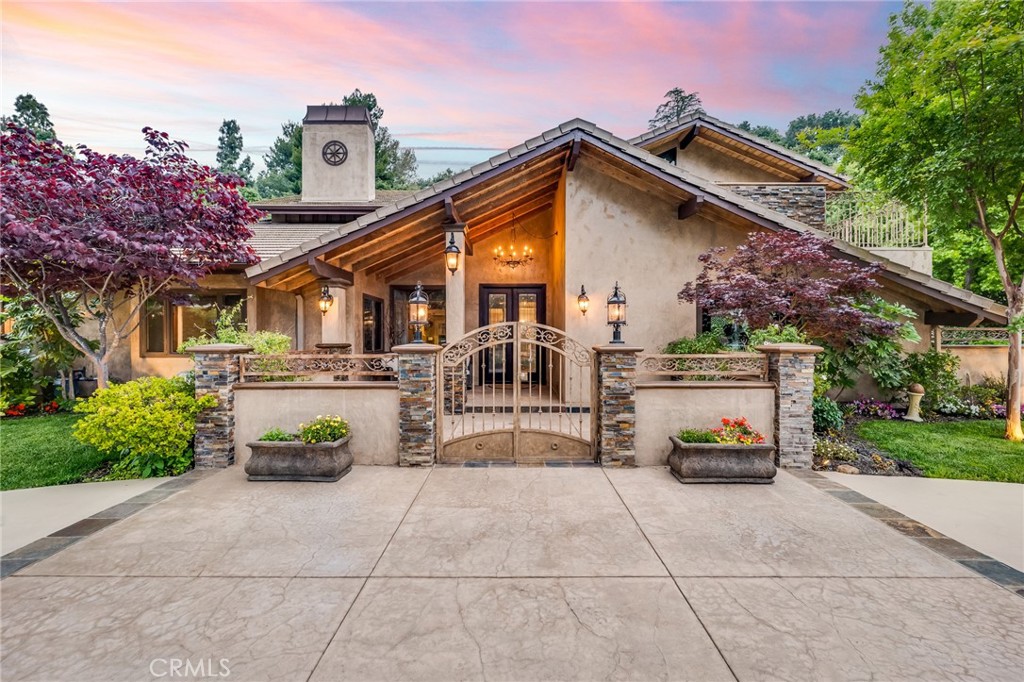 a view of house with outdoor space and porch