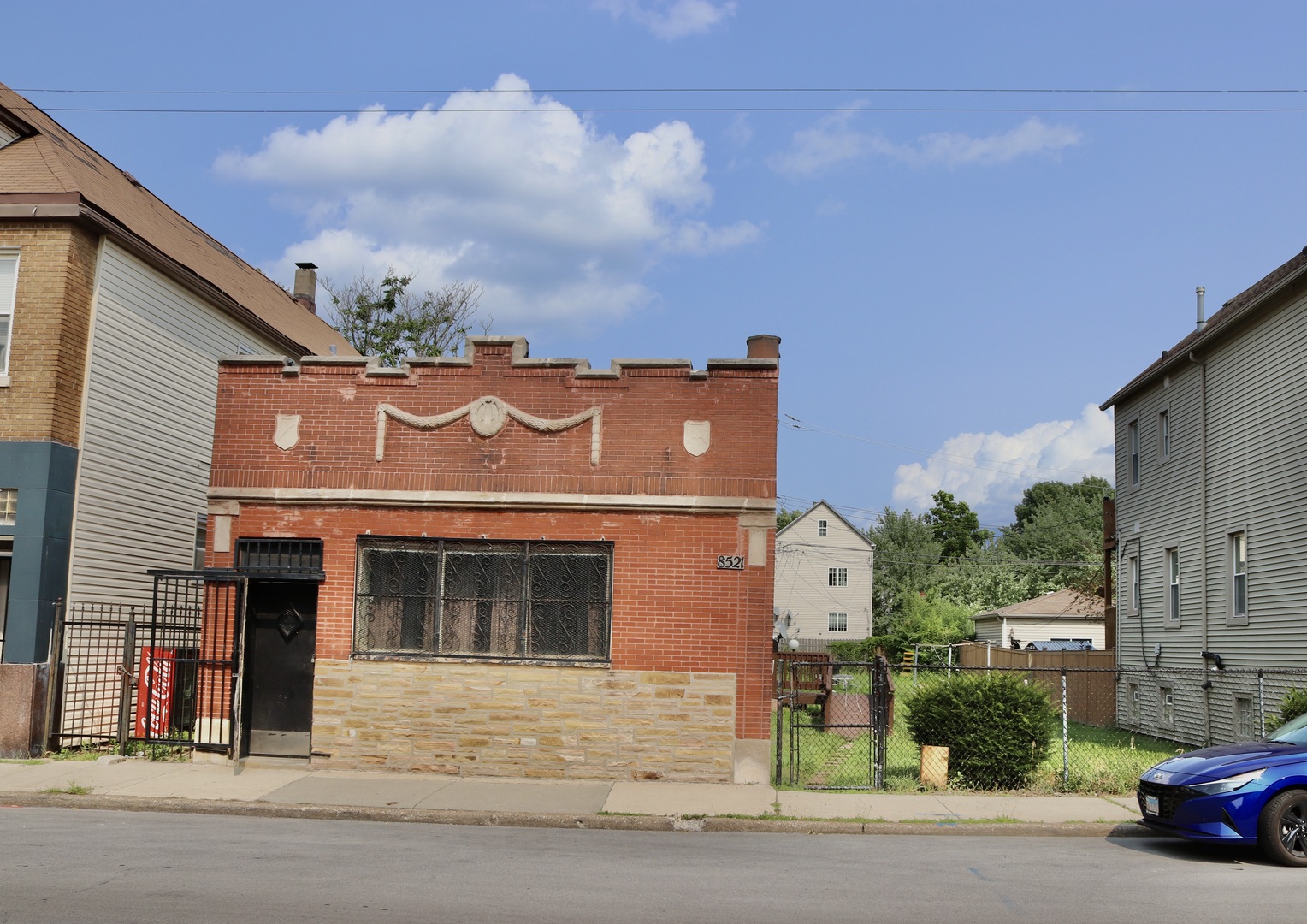 front view of a house with a street