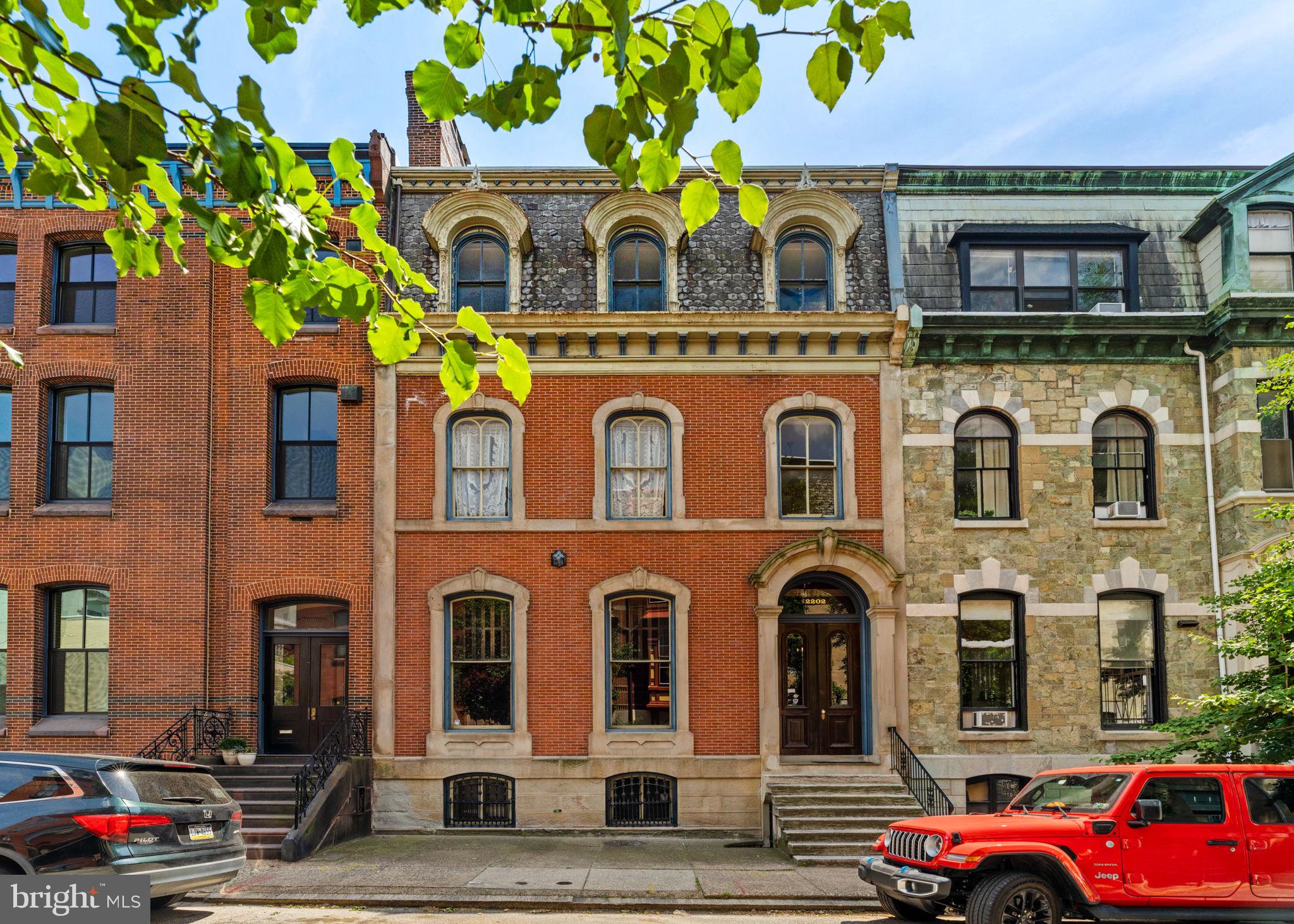 a front view of a multi story residential apartment building