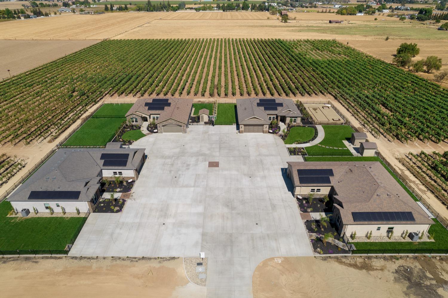 an aerial view of a house with a garden