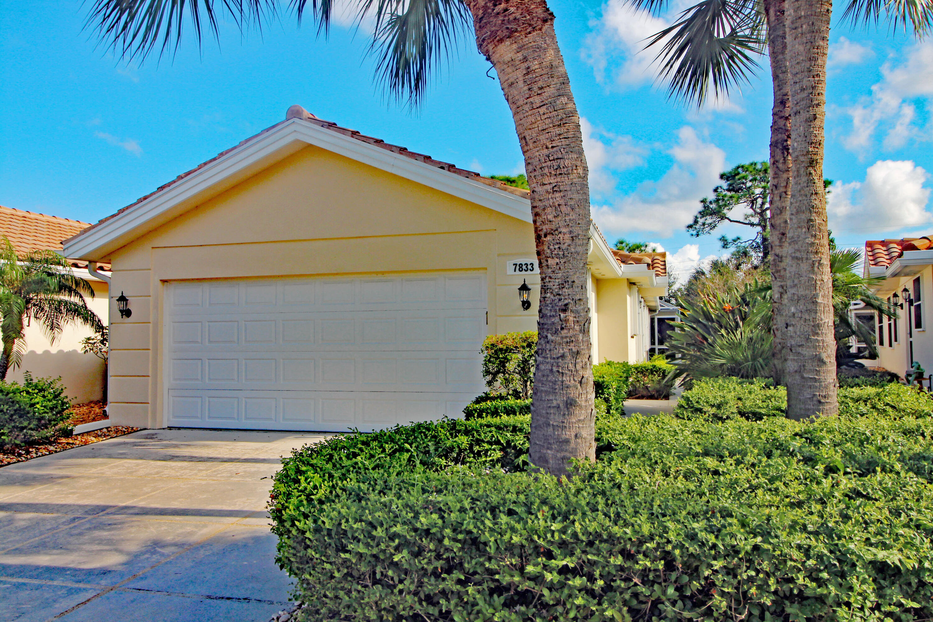 front view of a house with a small yard