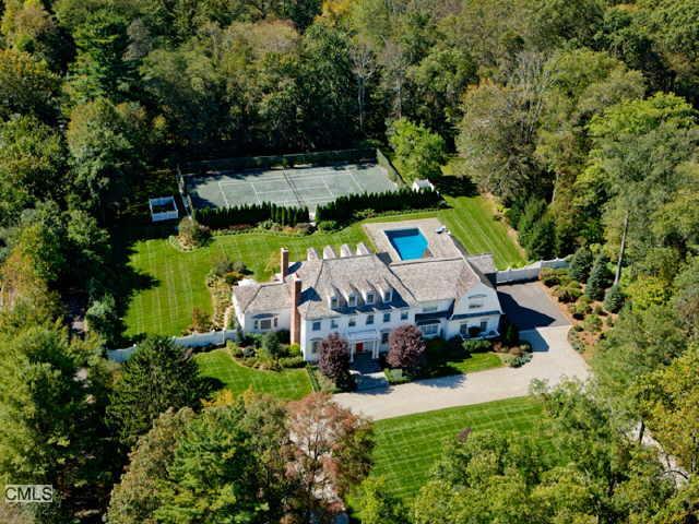 an aerial view of a house with a garden