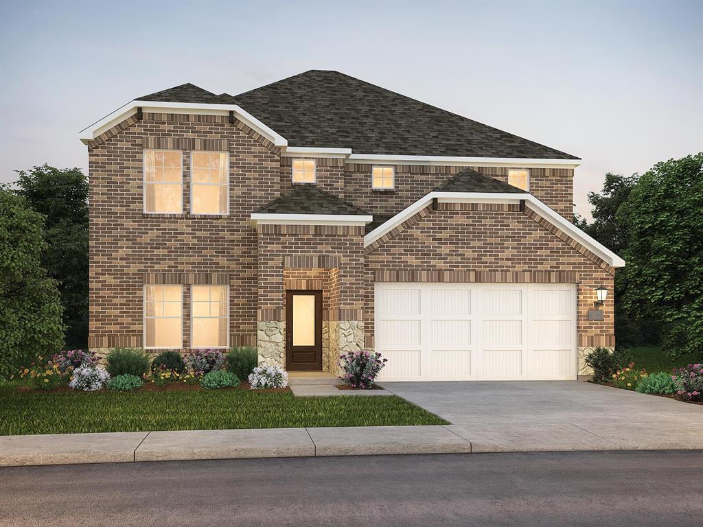 a front view of a house with a garden and garage