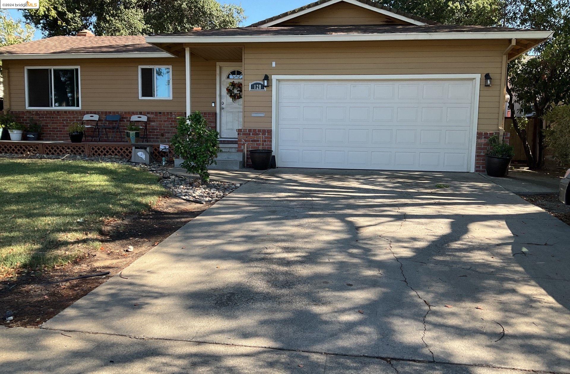 a view of outdoor space yard and garage