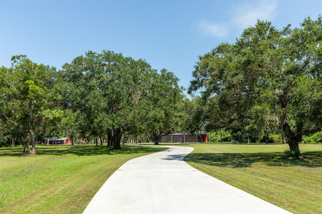 a view of a house with a big yard