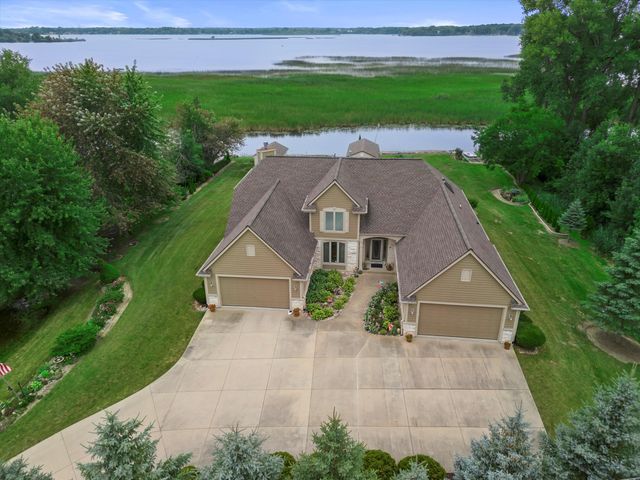 $875,000 | 7850 East Wind Lake Road | Wind Lake Lakefront