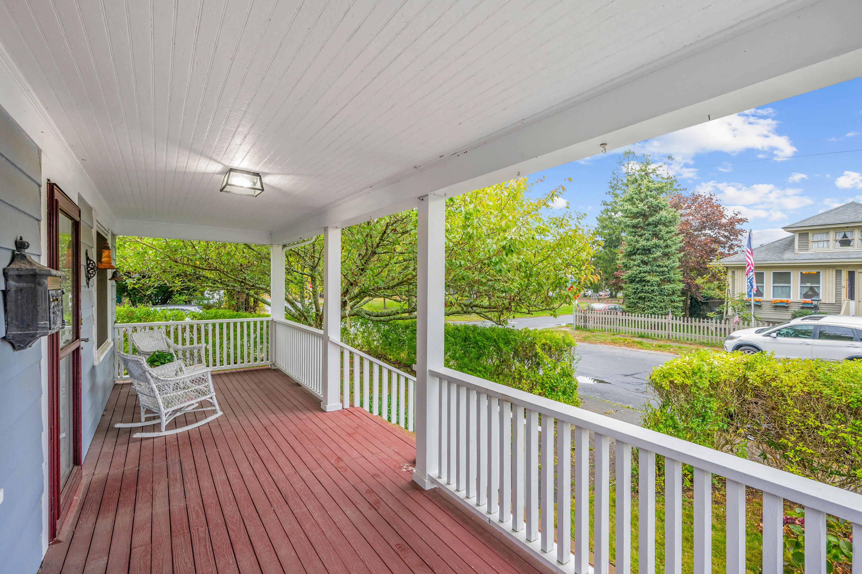 a view of balcony with furniture