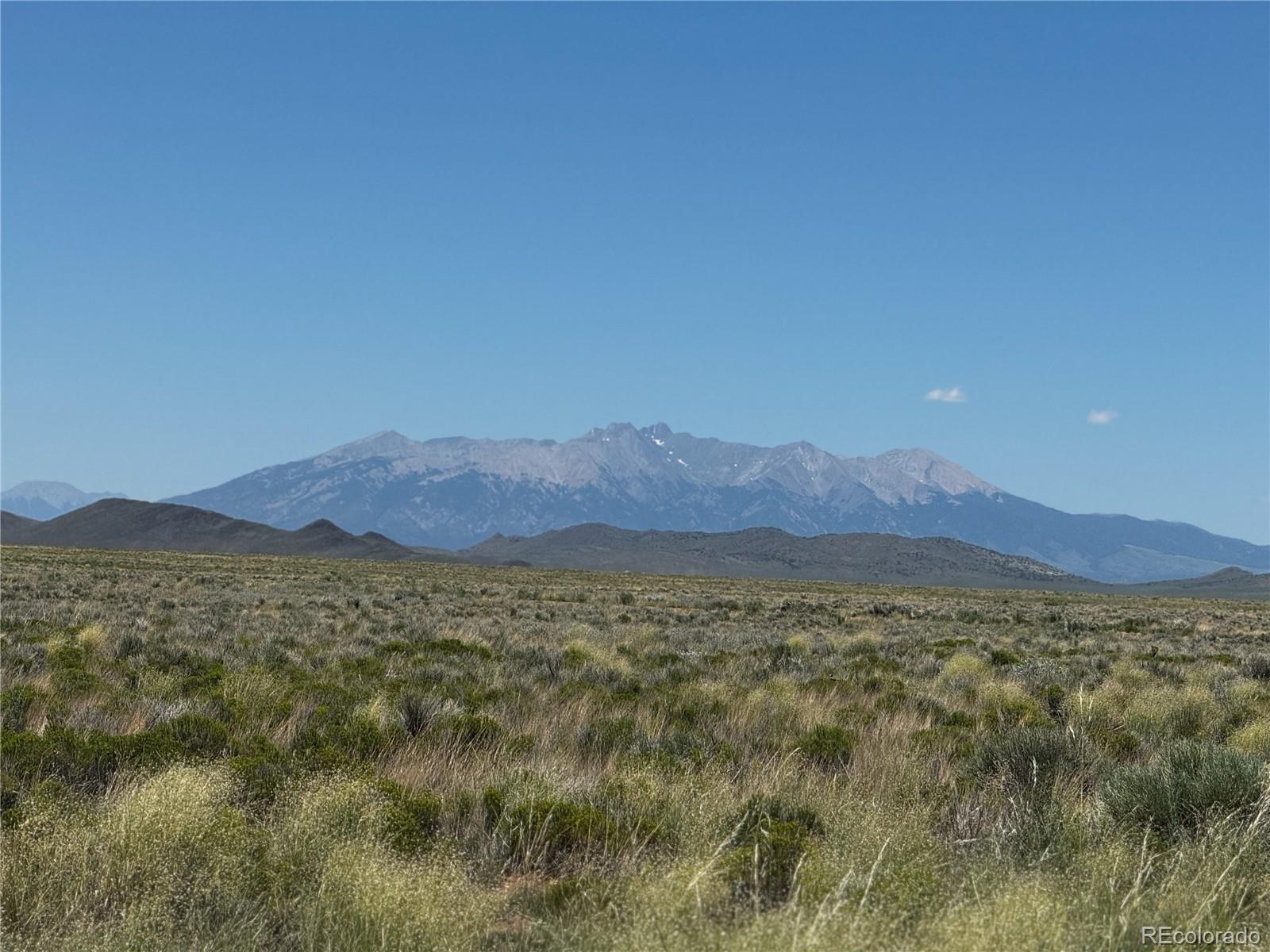 a view of mountain and a mountain