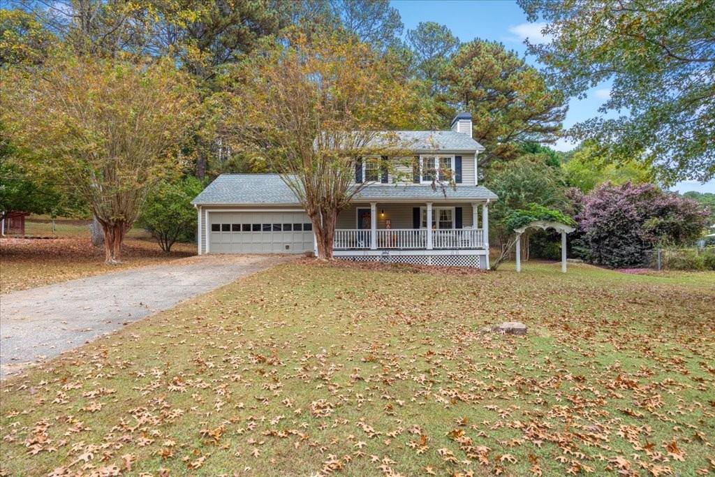 a house with trees in front of it