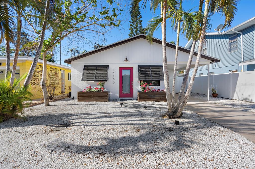 This home, a featured gem on 'For The Love of Old Houses,' is a completely updated, Tropical Oasis just a few steps away from the renowned Madeira Beach. 