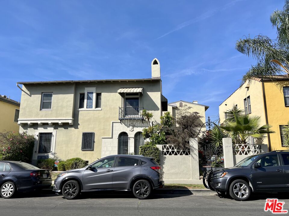 a car parked in front of a house