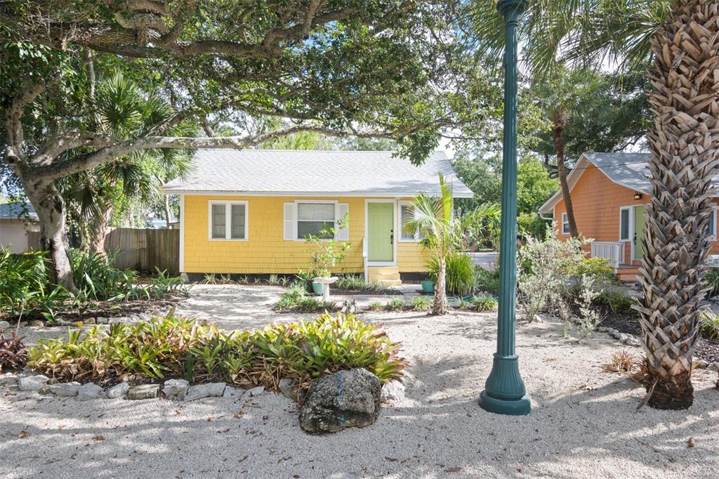 a house with trees in front of it