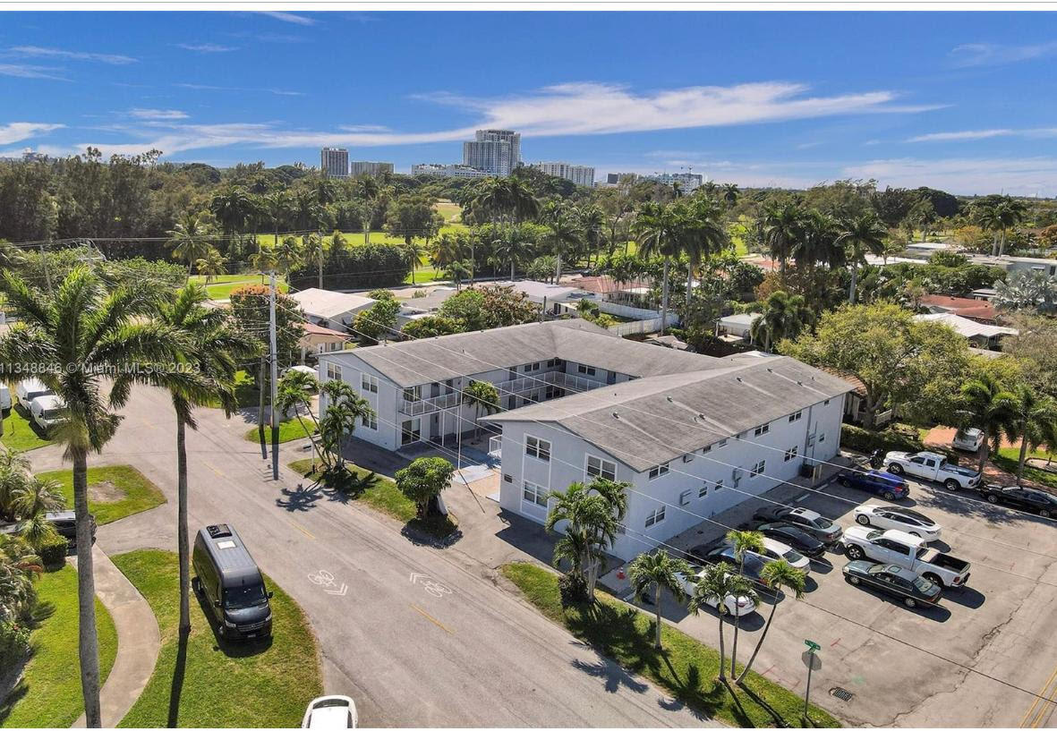 an aerial view of a house with a garden