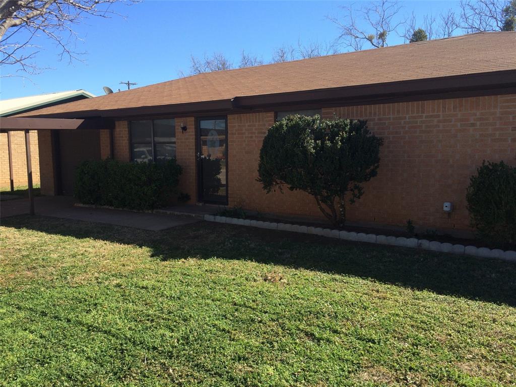 a front view of house with yard