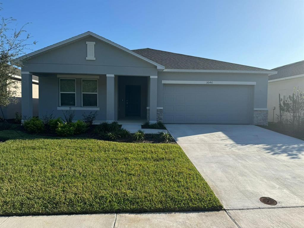 a front view of house with yard