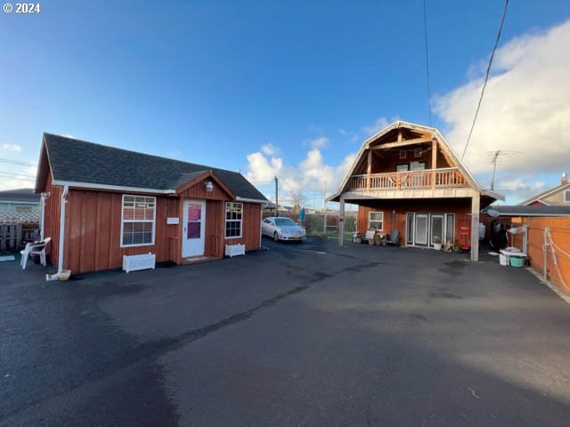 a view of a house with a roof deck