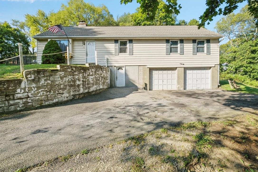 View of front facade with a garage