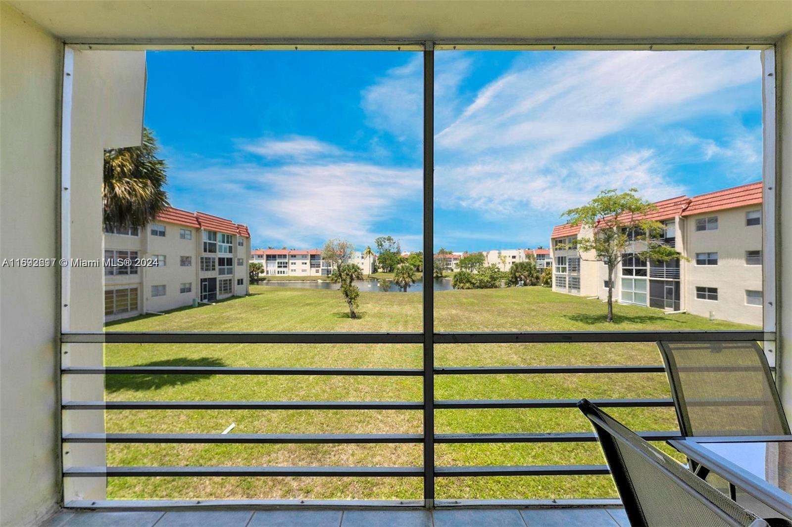 a view of a balcony with city view