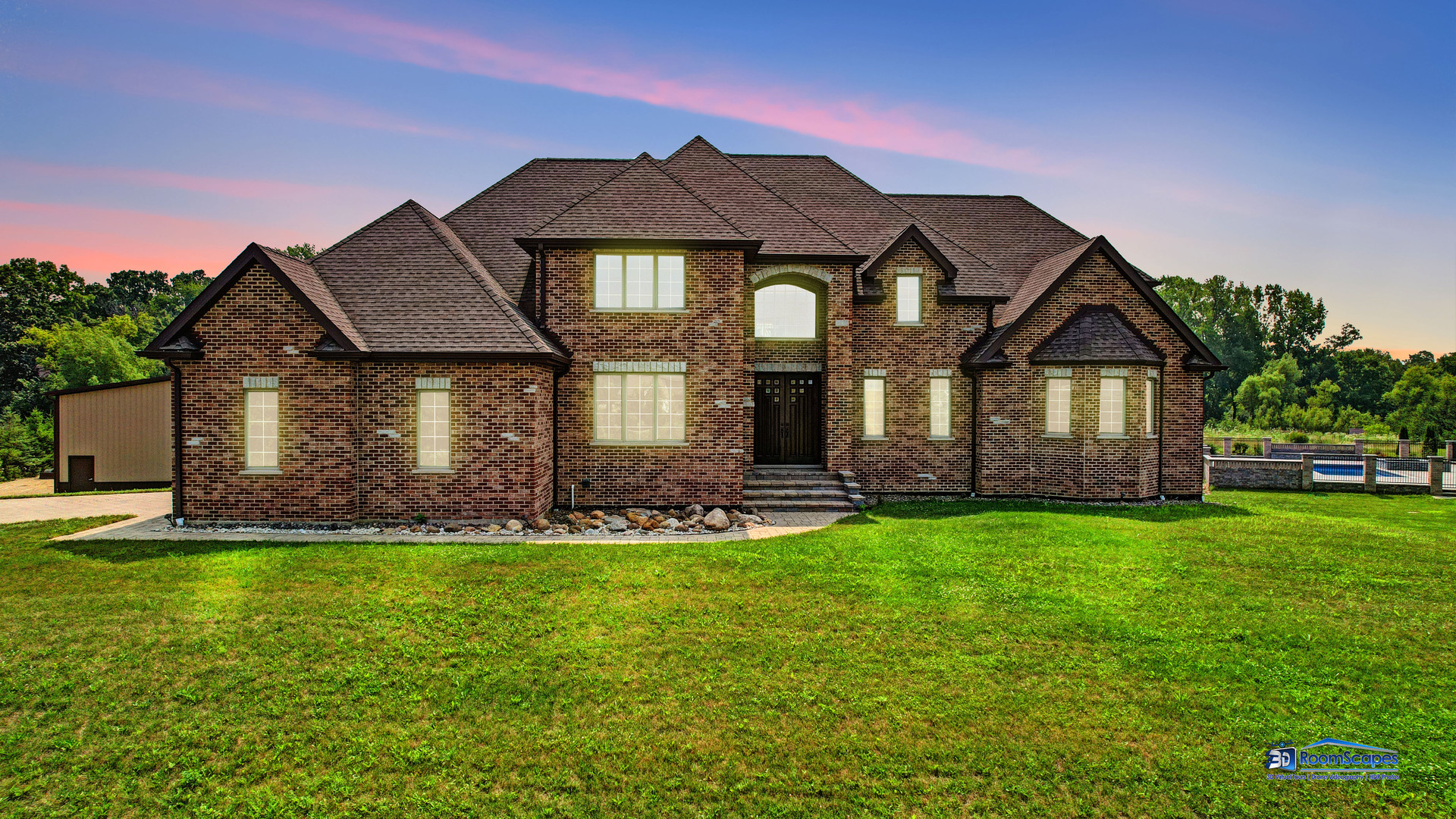 a front view of a house with a yard