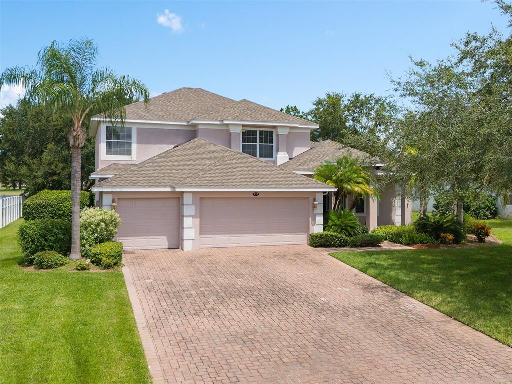 front view of a house and a yard