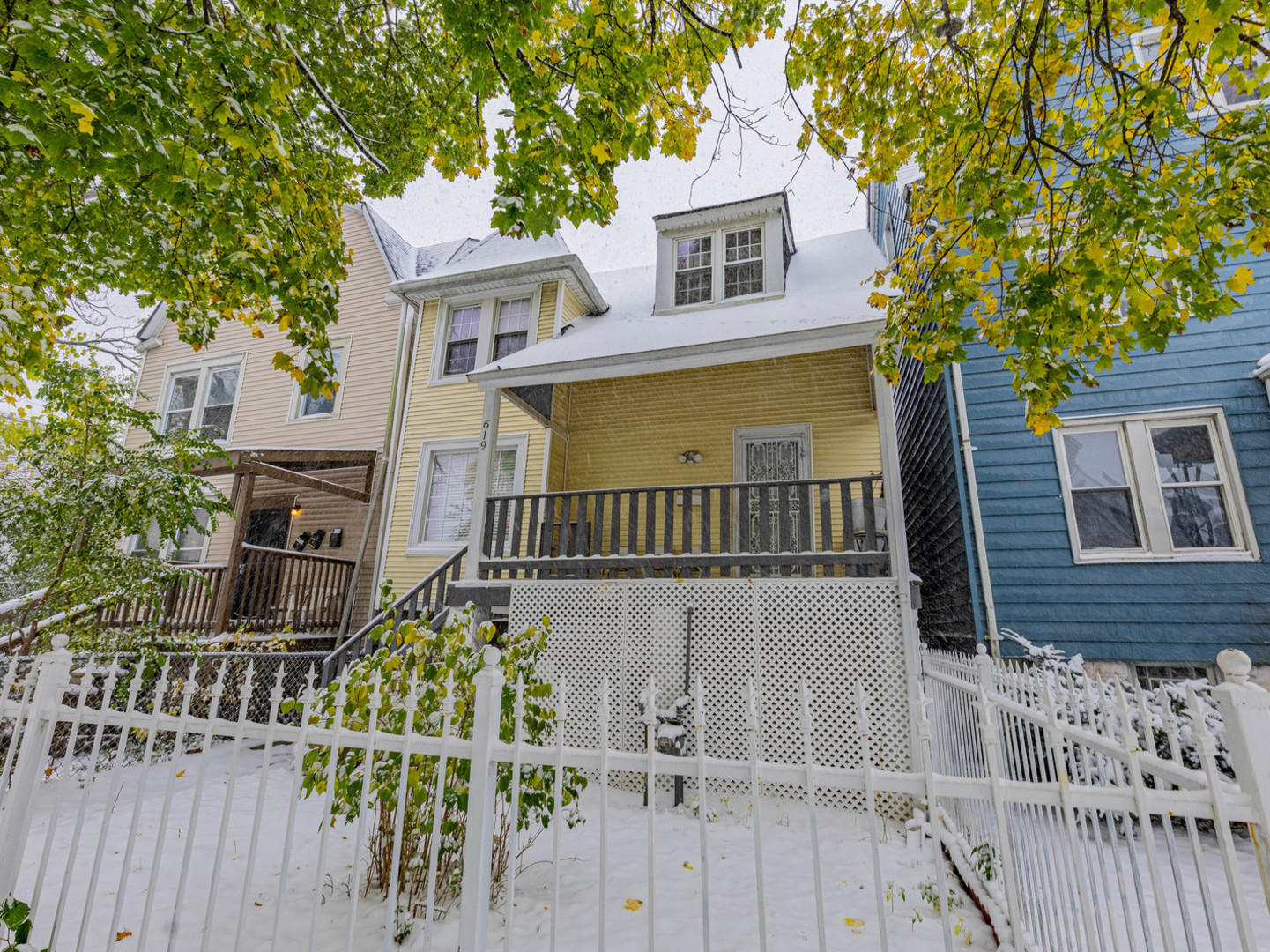 front view of a house with a small yard