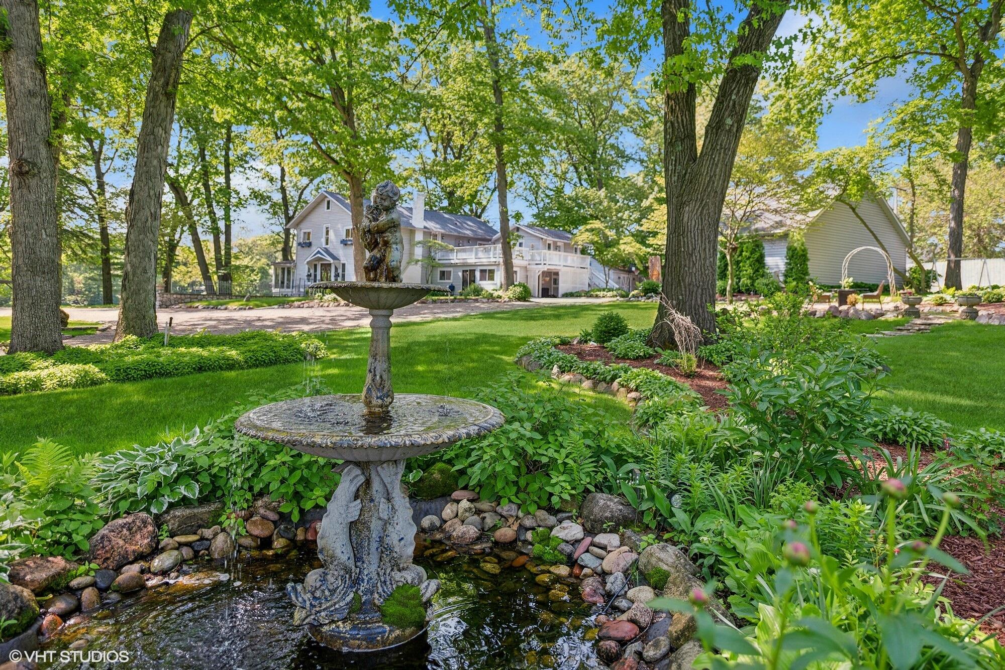 a garden view with a seating space