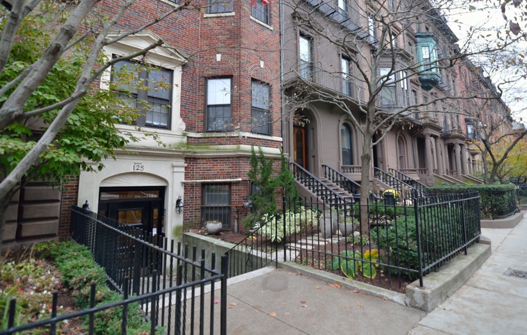 a front view of a house with a balcony