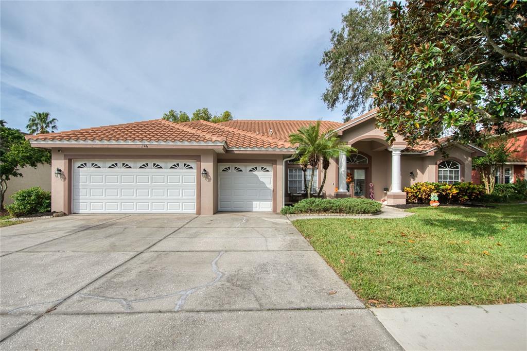 front view of a house with a yard