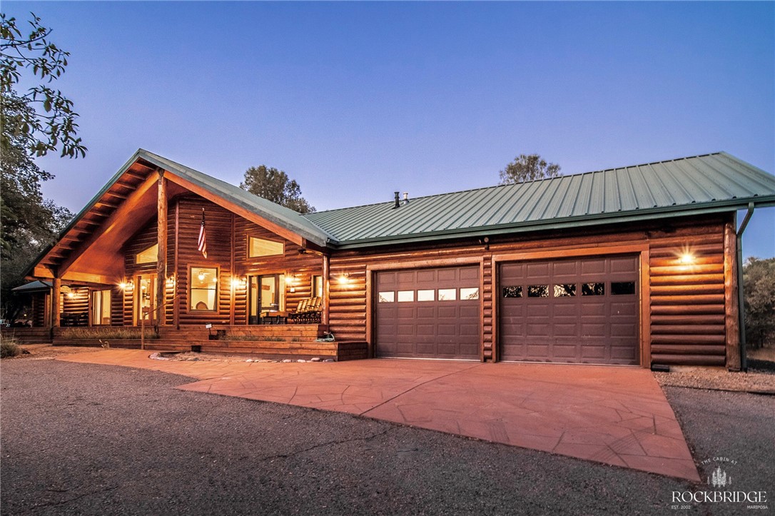 a front view of a building with garage