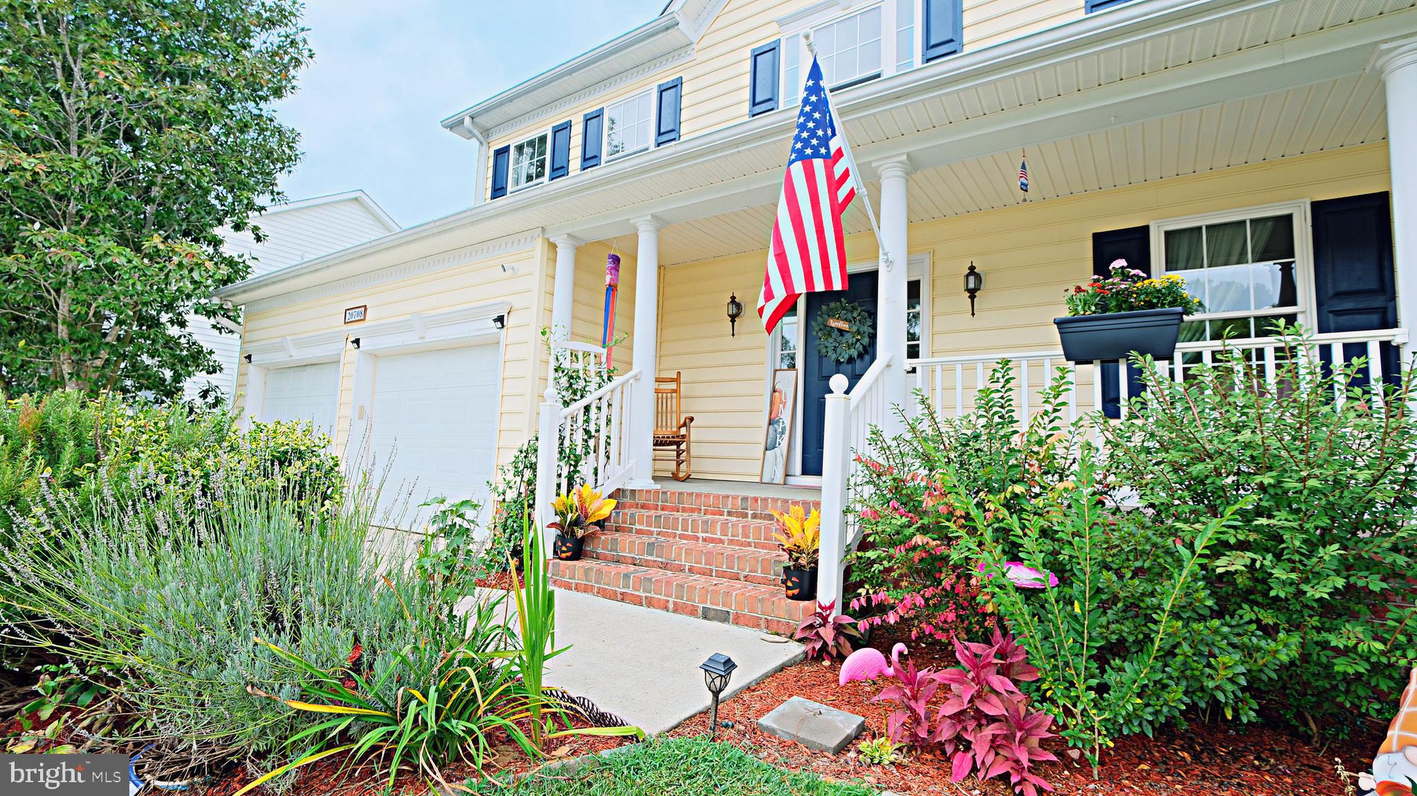 a front view of house with yard