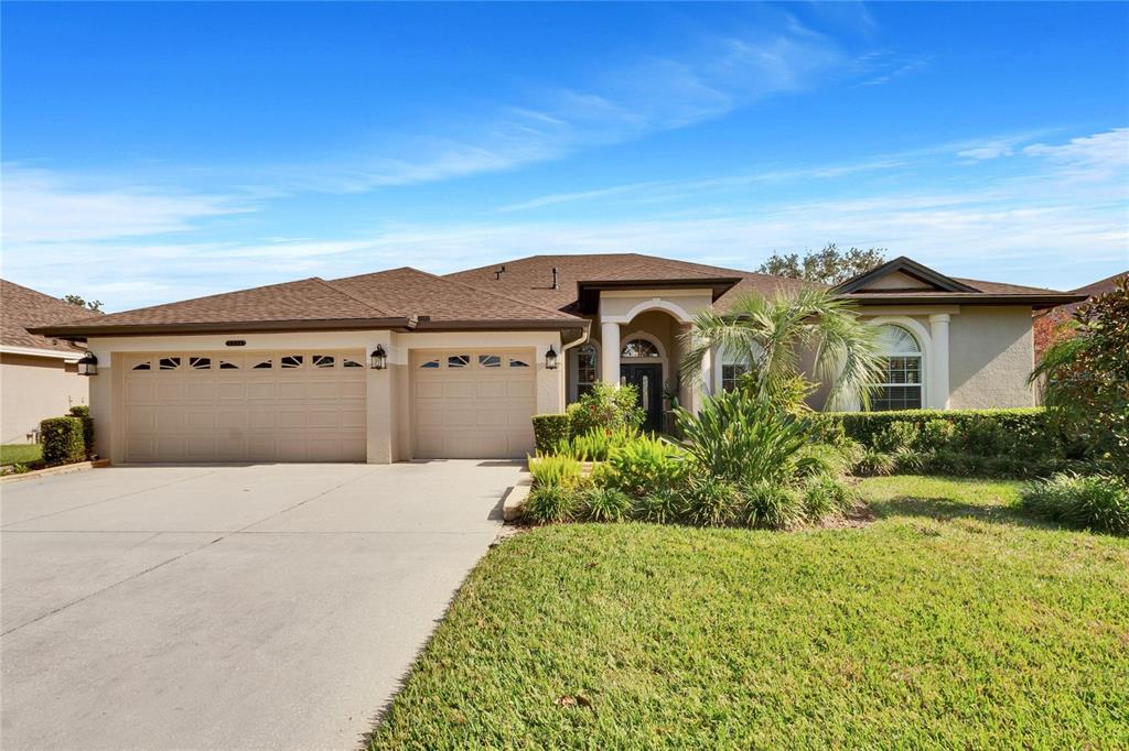 front view of a house with a yard