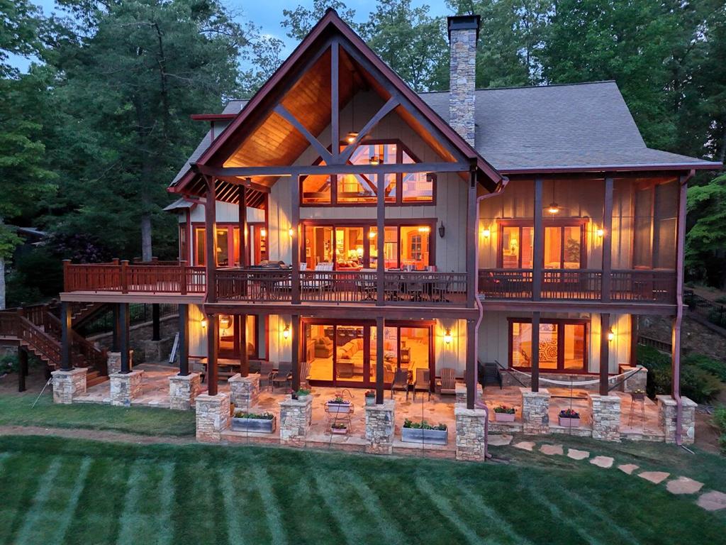 a front view of house with yard outdoor seating and green space