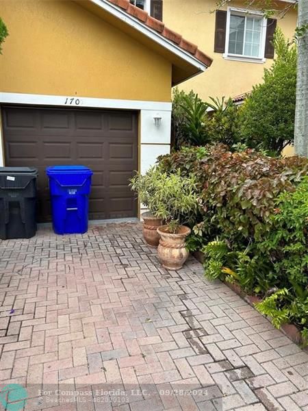 a view of a backyard of the house