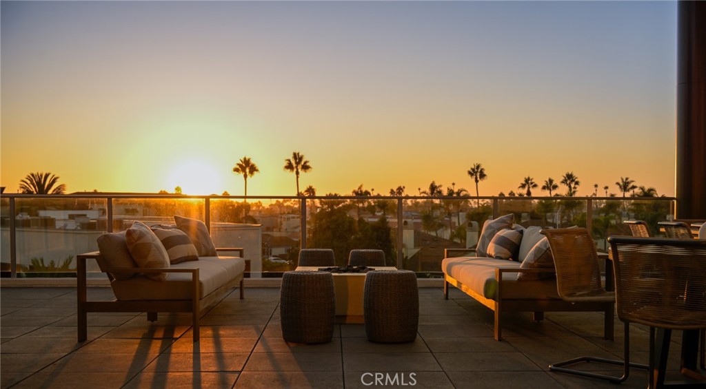 a view of a terrace with furniture