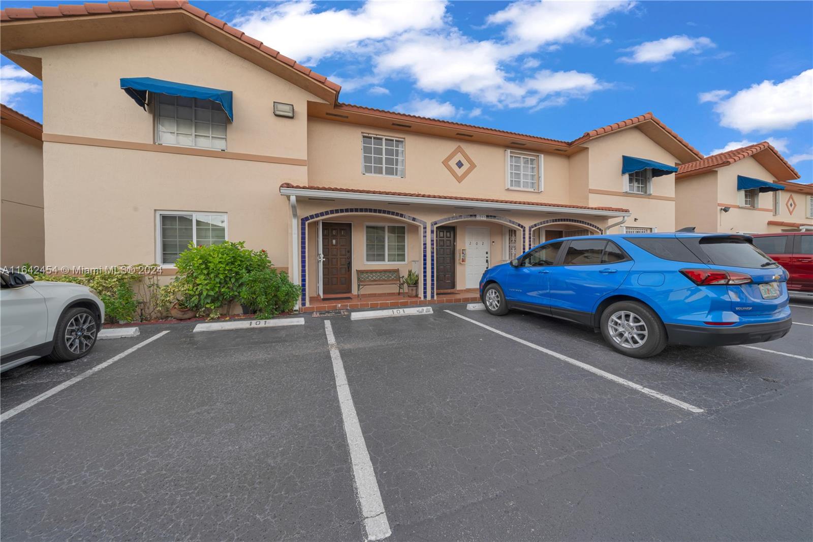 a car parked in front of a house