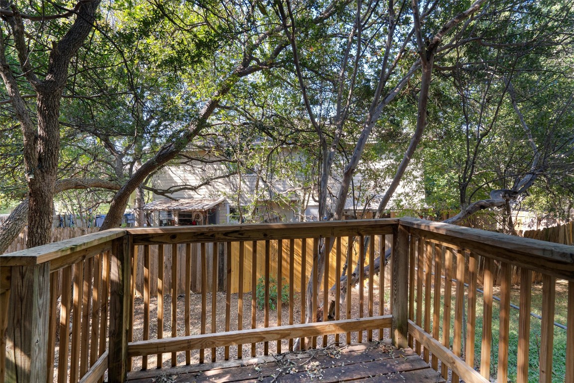 a view of trees in a balcony