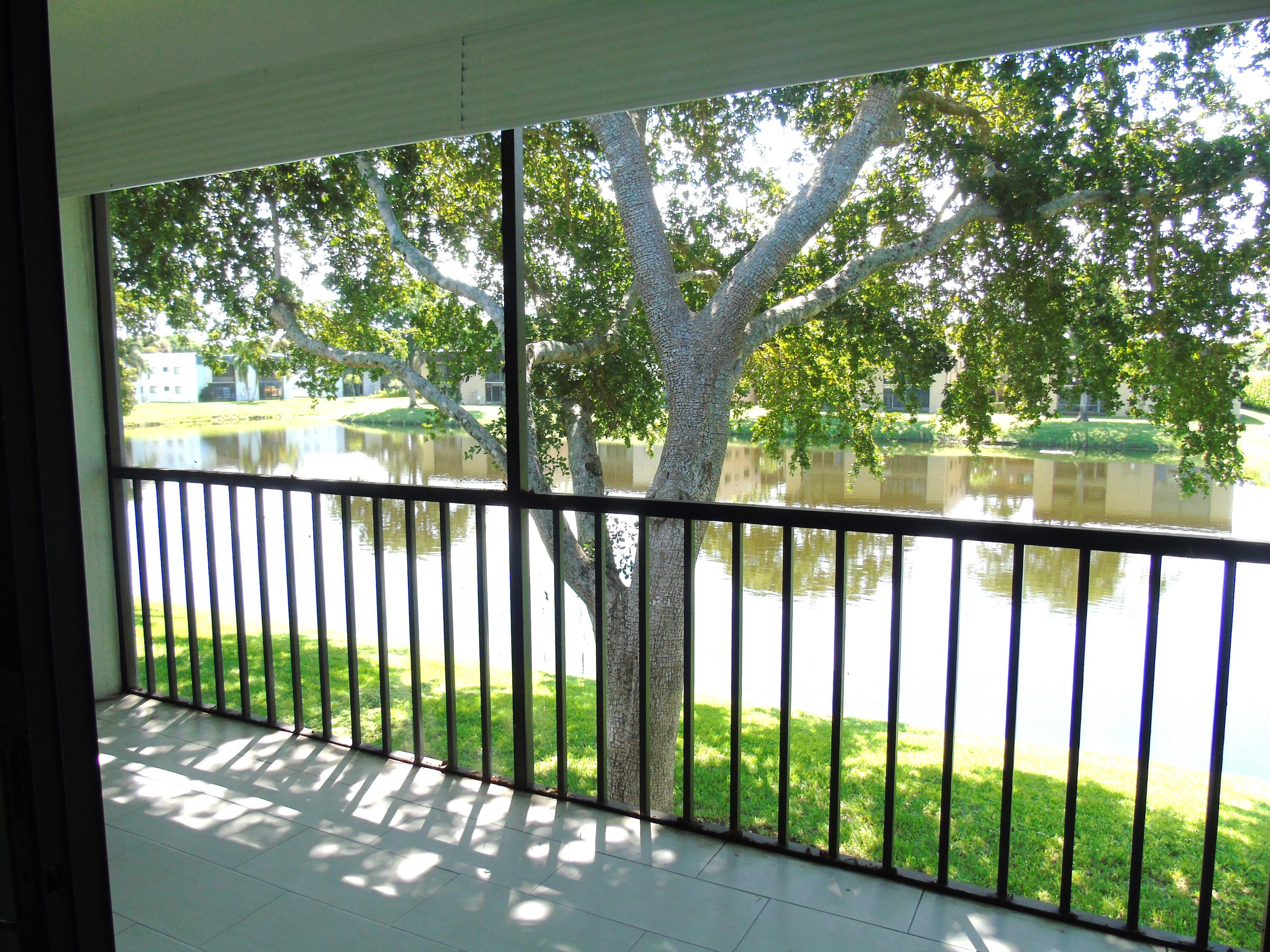 a view of a street view from a balcony