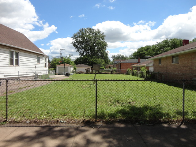 a view of a garden with a slide