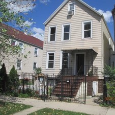 a front view of a house with a garage