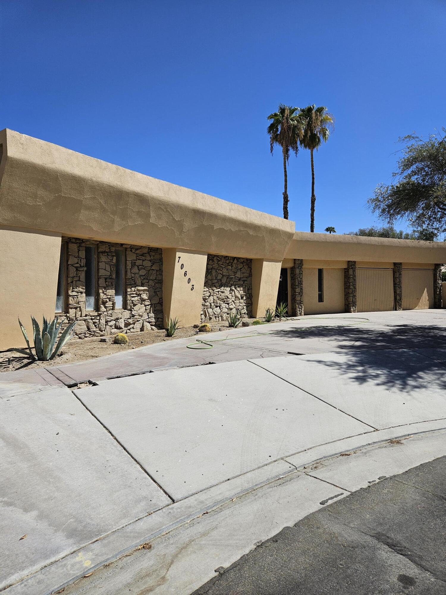 front view of a house with a street