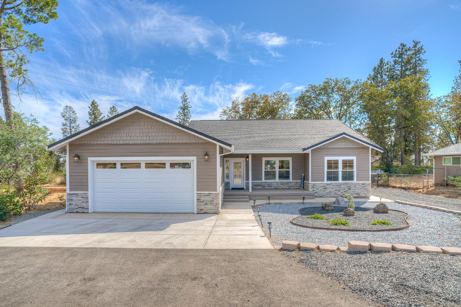 a front view of house with yard