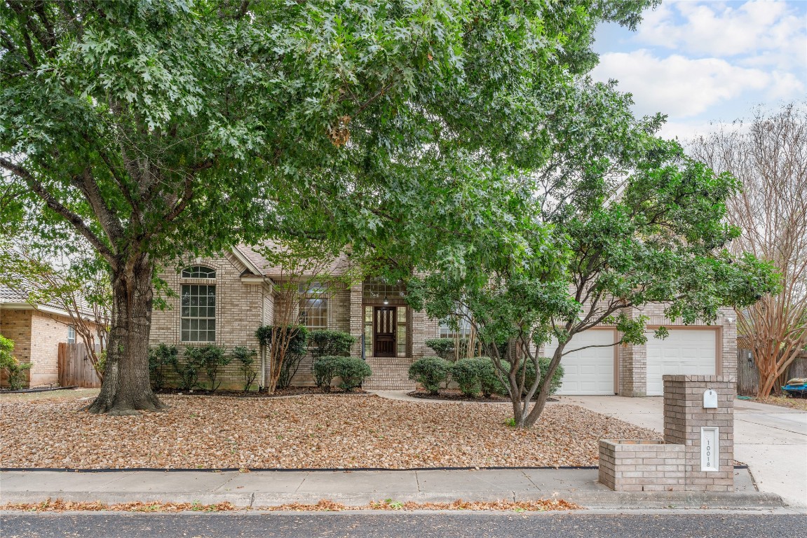 Welcome Home!  Xeroscape front yard with large shade tree