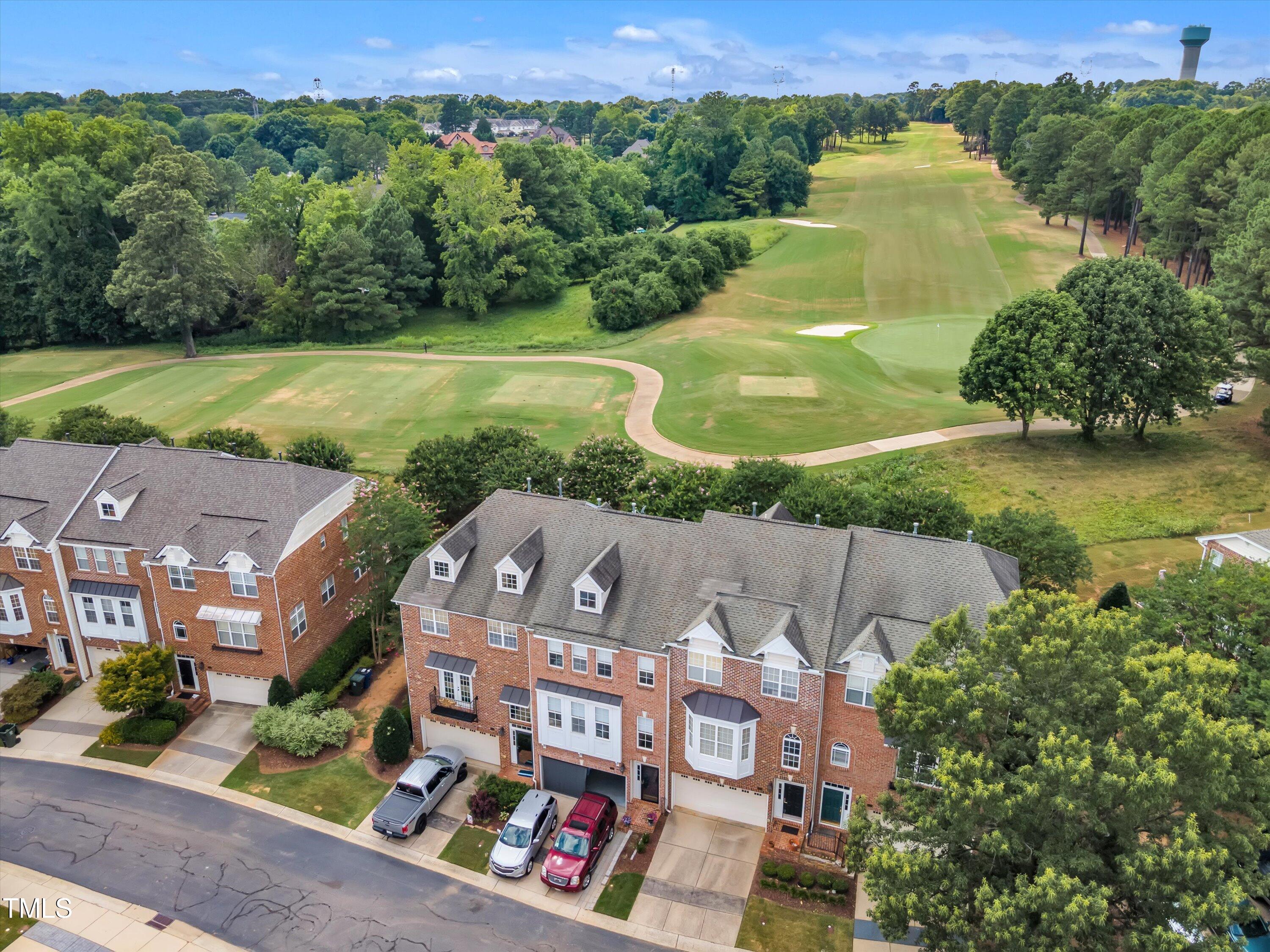 an aerial view of a house with a garden