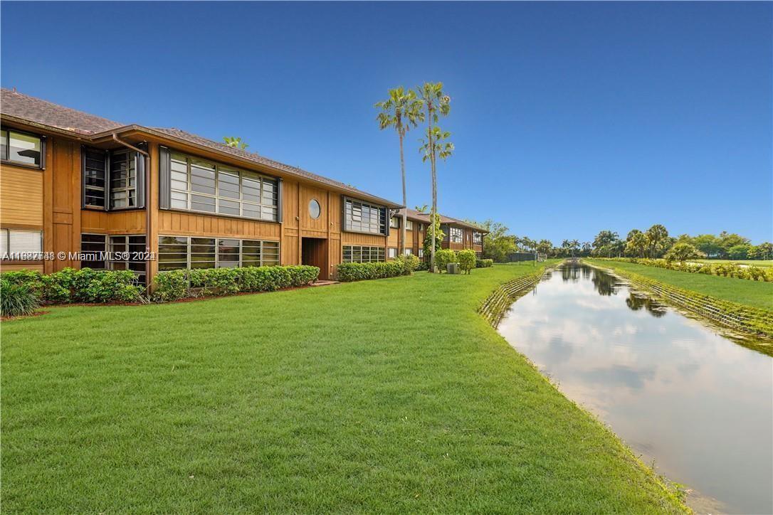 a view of a house with a big yard